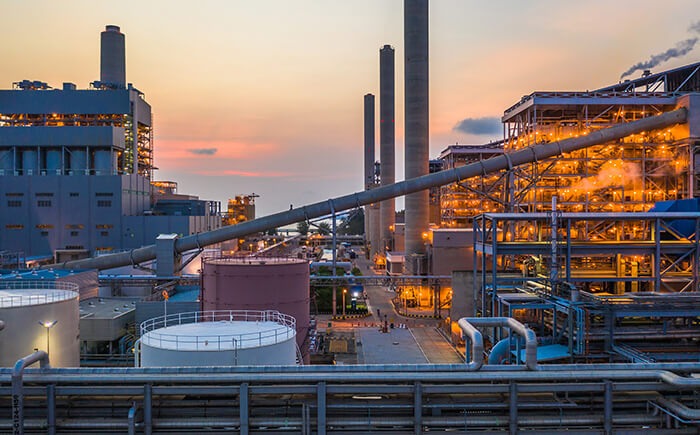 View of steel plant illuminated by lights