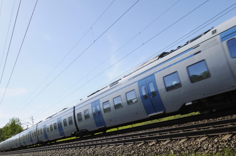 High speed train traveling on train tracks
