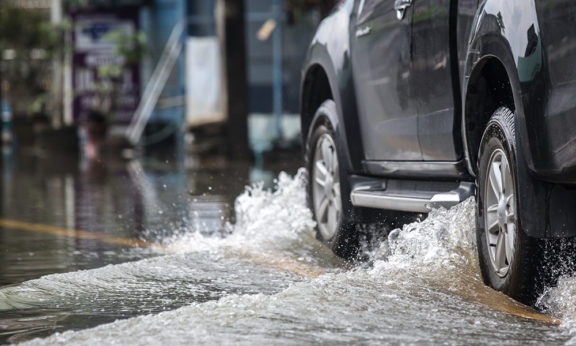 Car driving in rainstorm