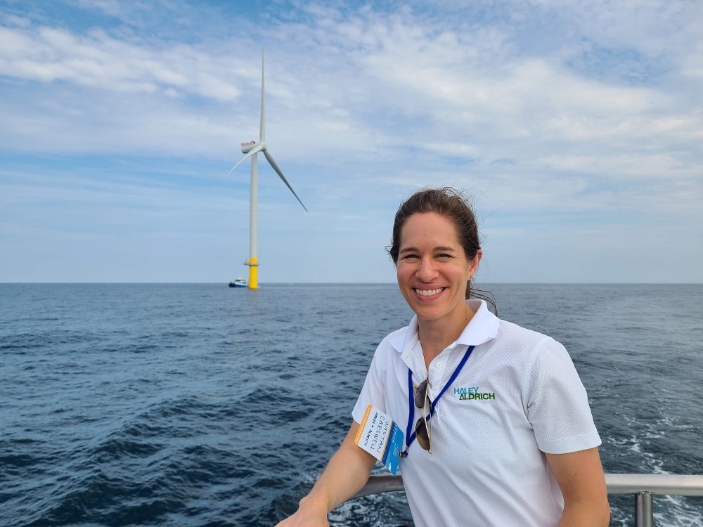 Wystan Carswell with offshore wind turbine