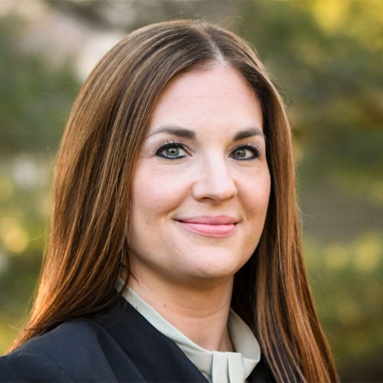 Headshot of woman, Suzanne Bell