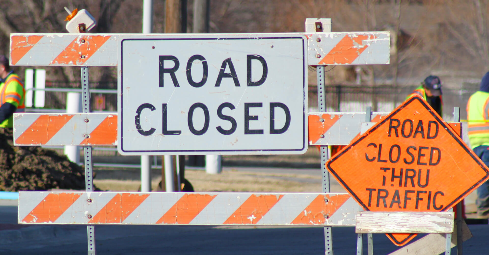 Photo of road closure. street signage.