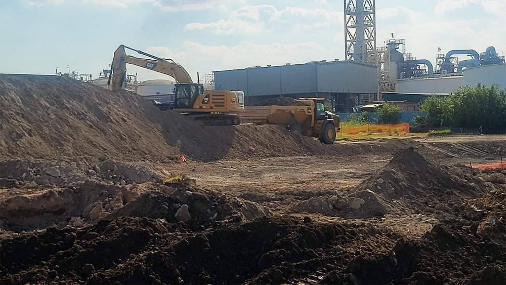 construction site with machinery on dirt.