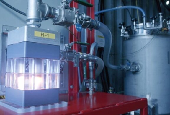 Plasma vortex reactor showing glowing plasma arc