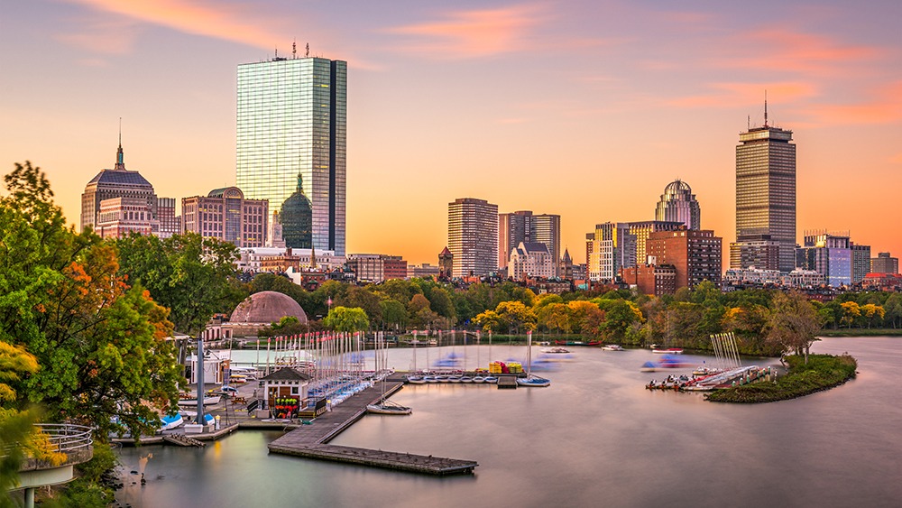 Downtown Boston and the Charles River at sunset.