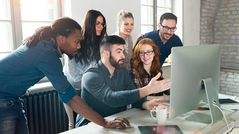 People looking at computer